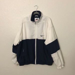 white and navy nike windbreaker